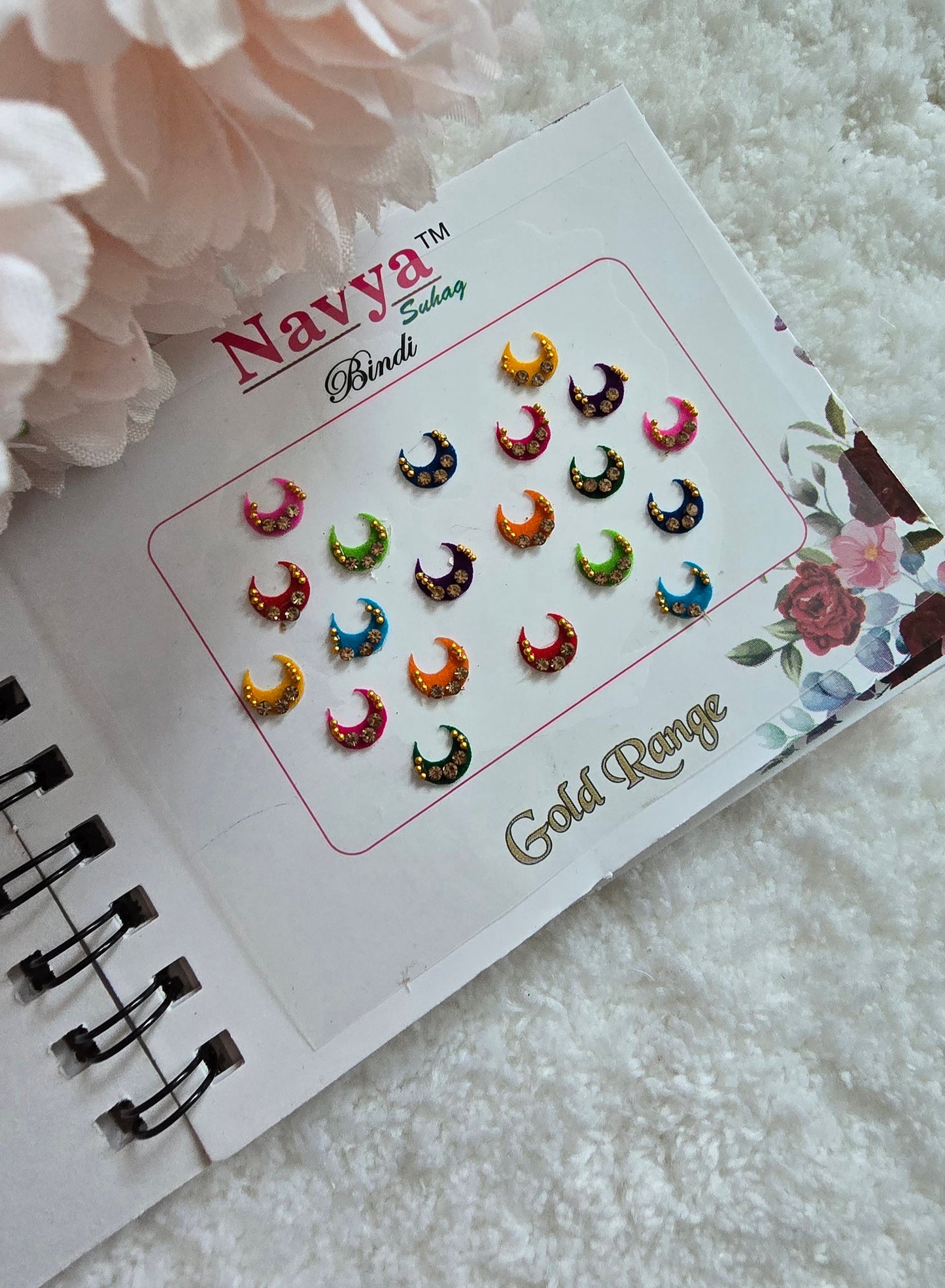 Pack of 4 - Navya multi-colored pocket size party wear fancy stone studded spiral Bindi book.