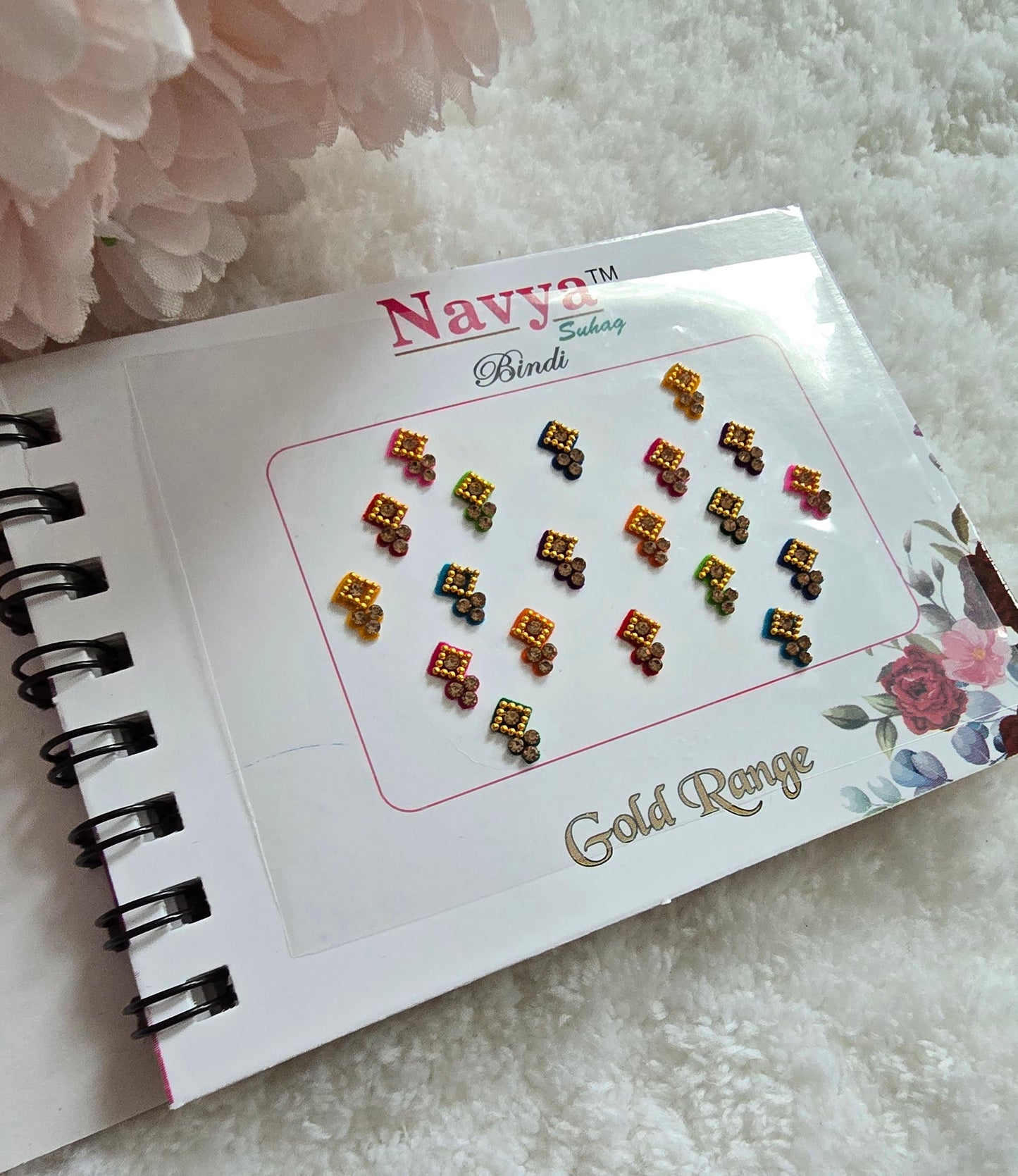 Pack of 4 - Navya multi-colored pocket size party wear fancy stone studded spiral Bindi book.