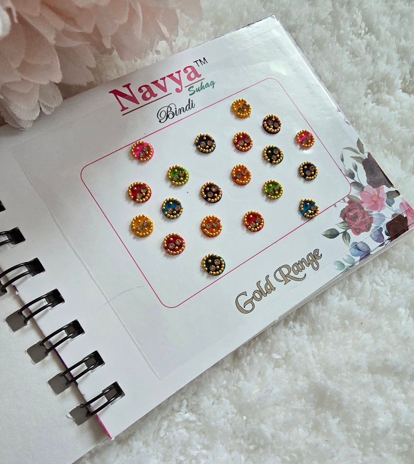 Pack of 4 - Navya multi-colored pocket size party wear fancy stone studded spiral Bindi book.