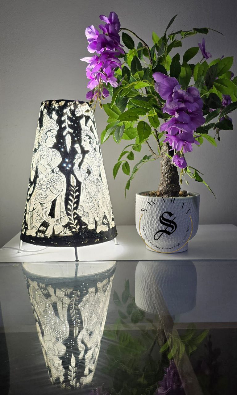 Black and white Hand-made leather lamp shade with hand painted theme of Radha- Krishna. Size - 12 inch.