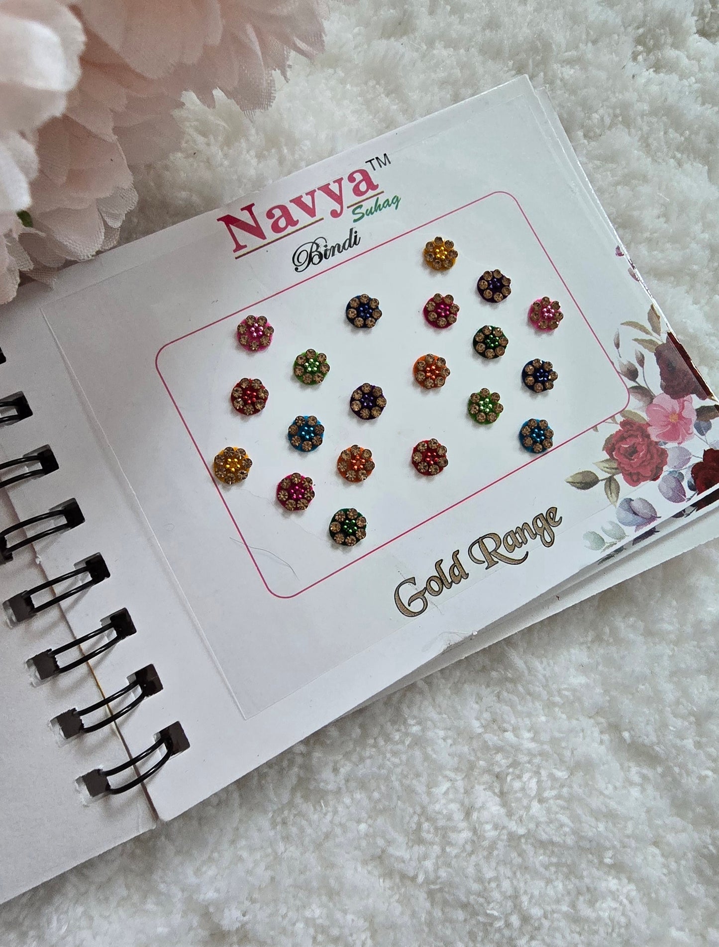 Pack of 4 - Navya multi-colored pocket size party wear fancy stone studded spiral Bindi book.