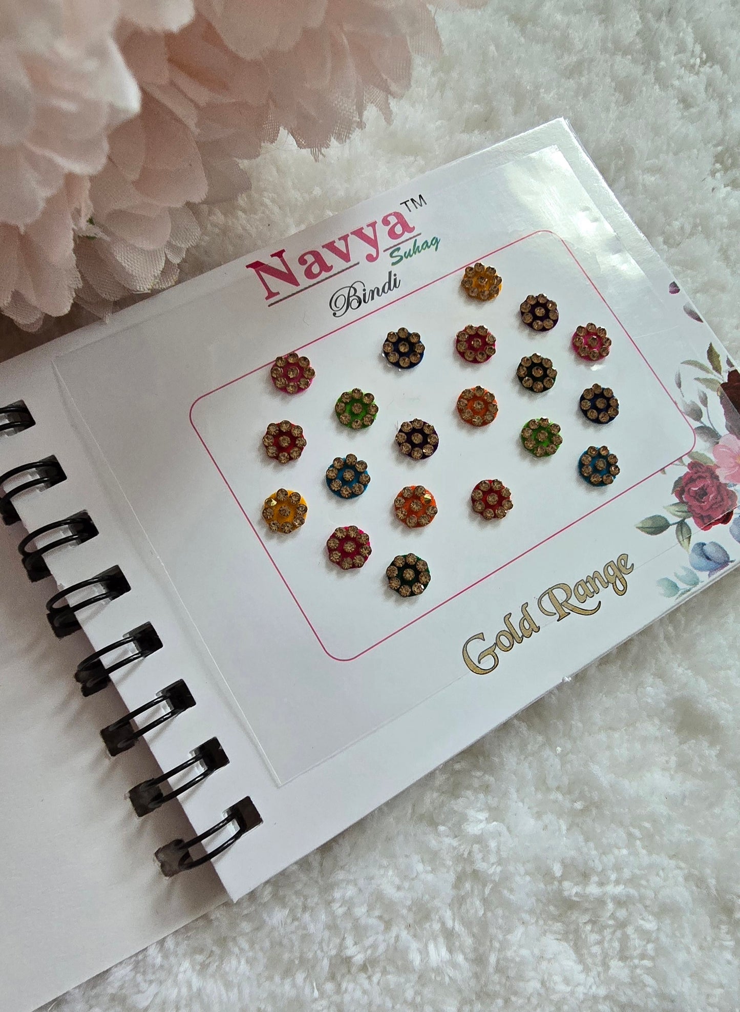 Pack of 4 - Navya multi-colored pocket size party wear fancy stone studded spiral Bindi book.