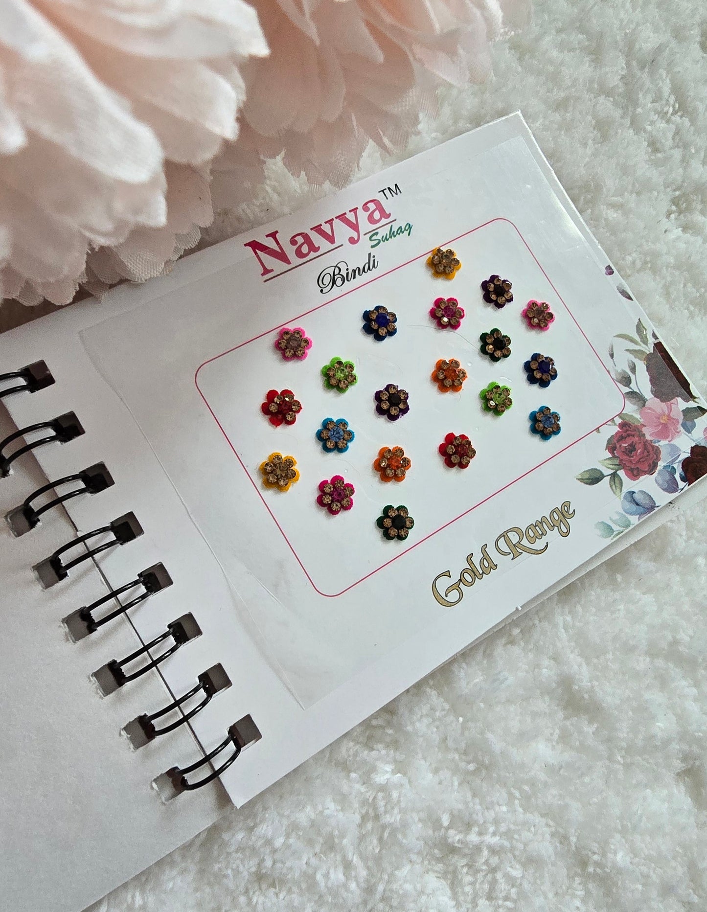 Pack of 4 - Navya multi-colored pocket size party wear fancy stone studded spiral Bindi book.