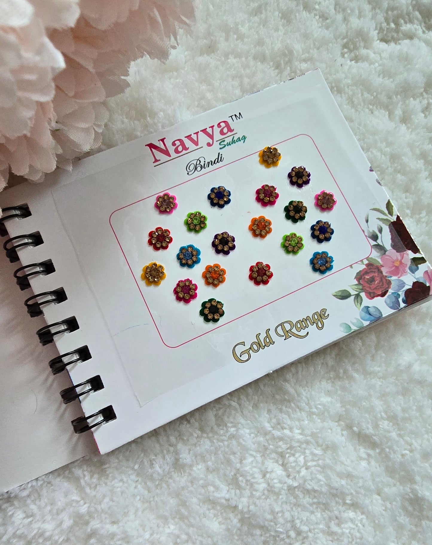 Pack of 4 - Navya multi-colored pocket size party wear fancy stone studded spiral Bindi book.