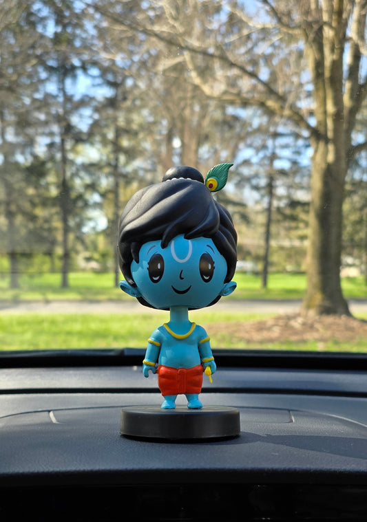 Car Dashboard Accessories - miniature Krishna with bobble head.