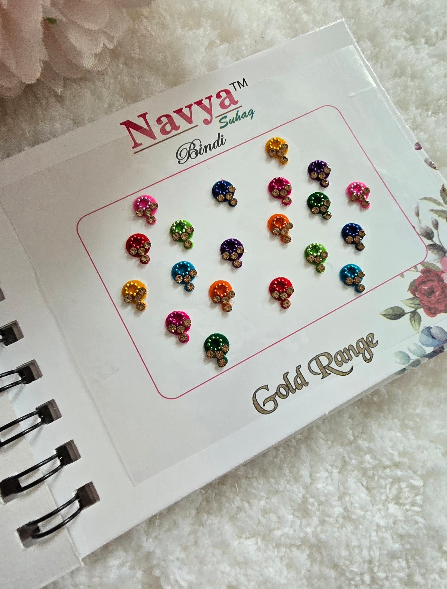 Pack of 4 - Navya multi-colored pocket size party wear fancy stone studded spiral Bindi book.