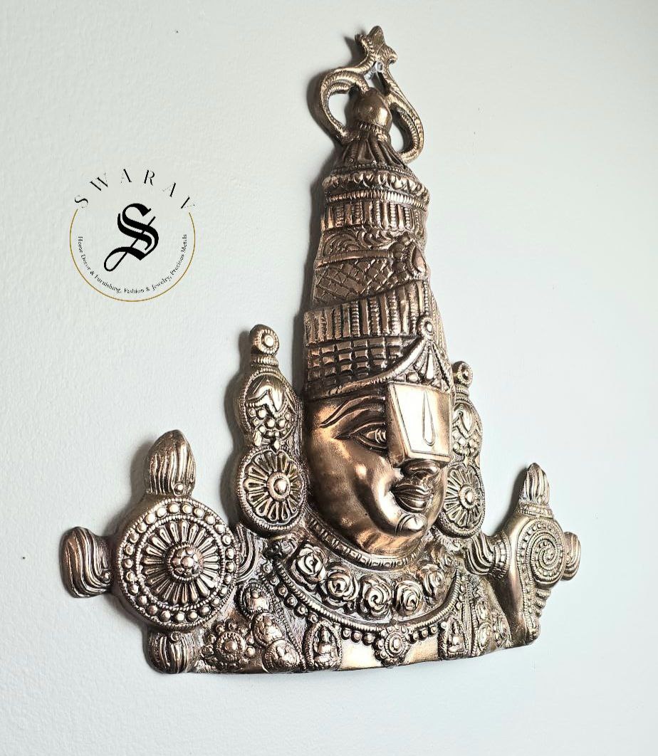 Black metal Balaji wall decor. Size - 15 by 12 inch