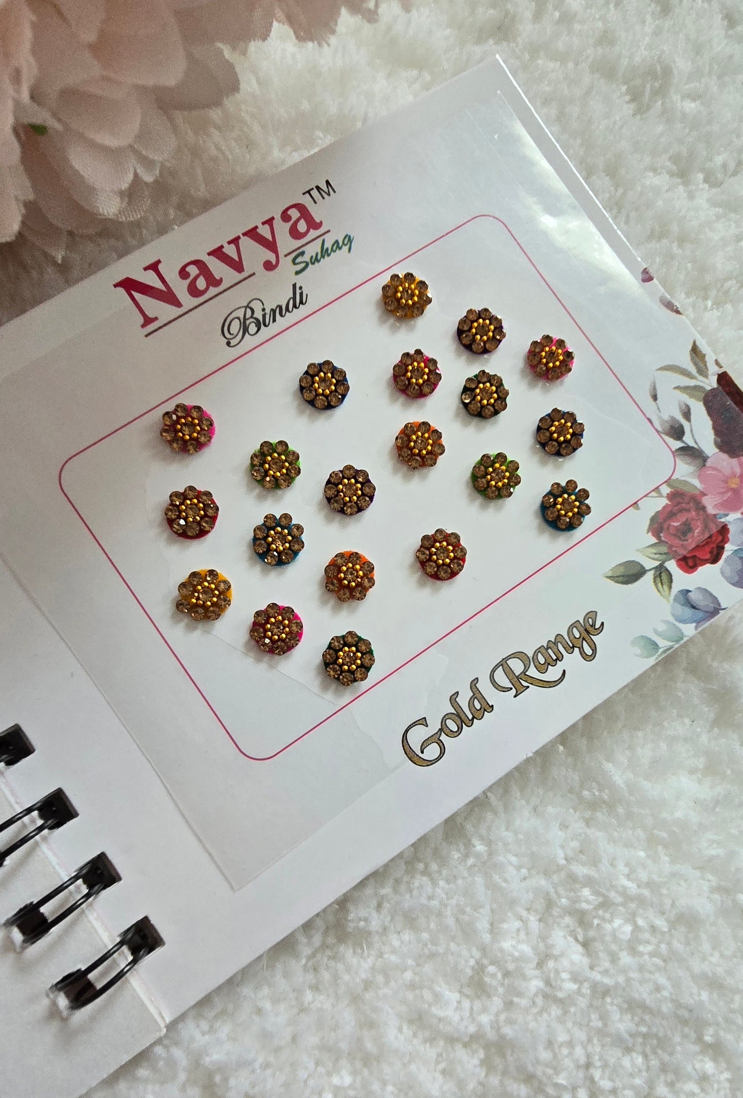 Pack of 4 - Navya multi-colored pocket size party wear fancy stone studded spiral Bindi book.