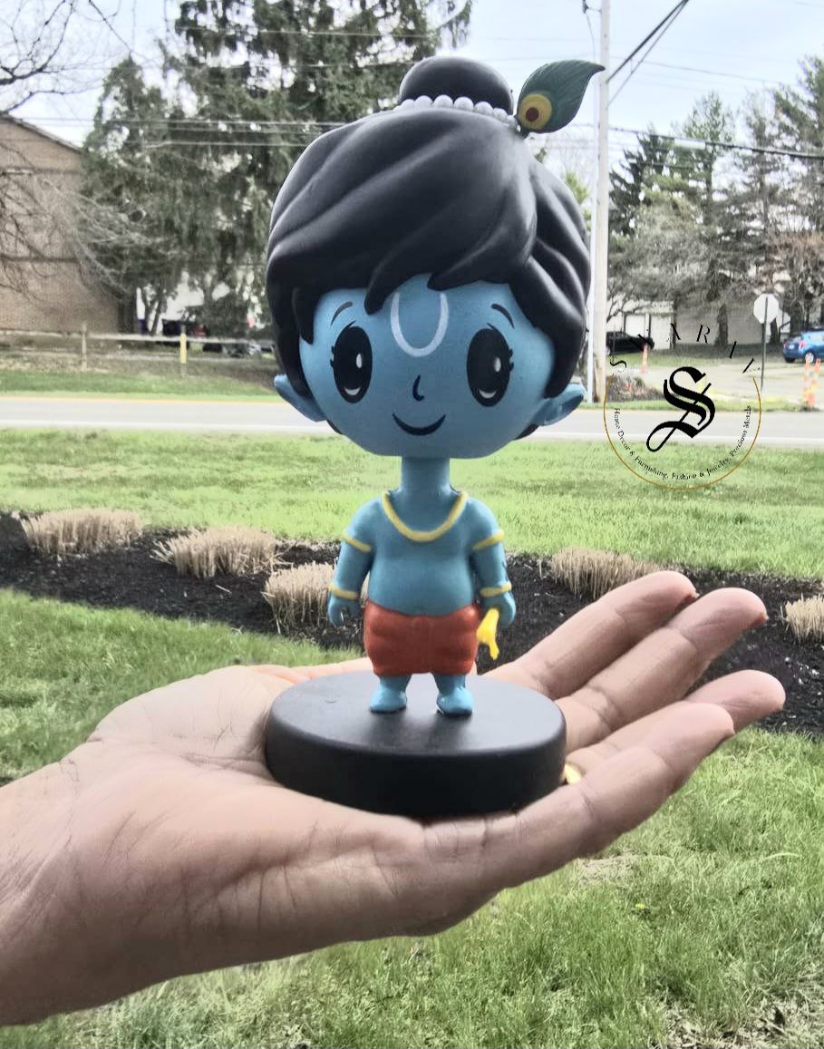 Car Dashboard Accessories - miniature Krishna with bobble head.