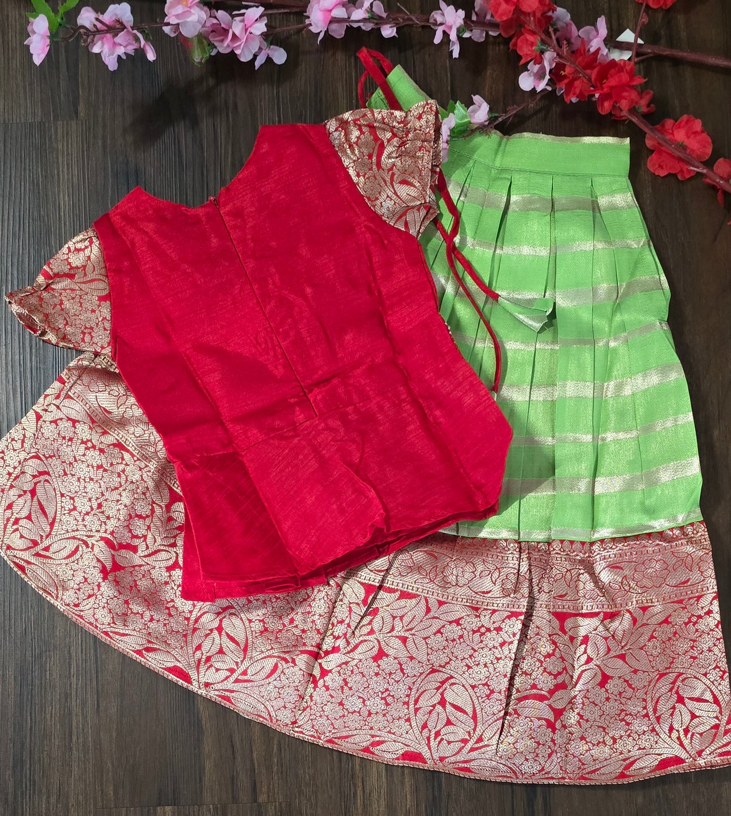 Zari woven cotton blend Pavadai set ( Ghaghra Blouse )for Baby Girl in parrot green and red combination.