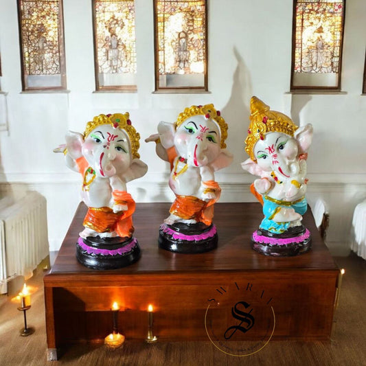 Set of 3 - CLAY made dancing baby Ganesha with marble like finish and shine. Size - 7 inch each.