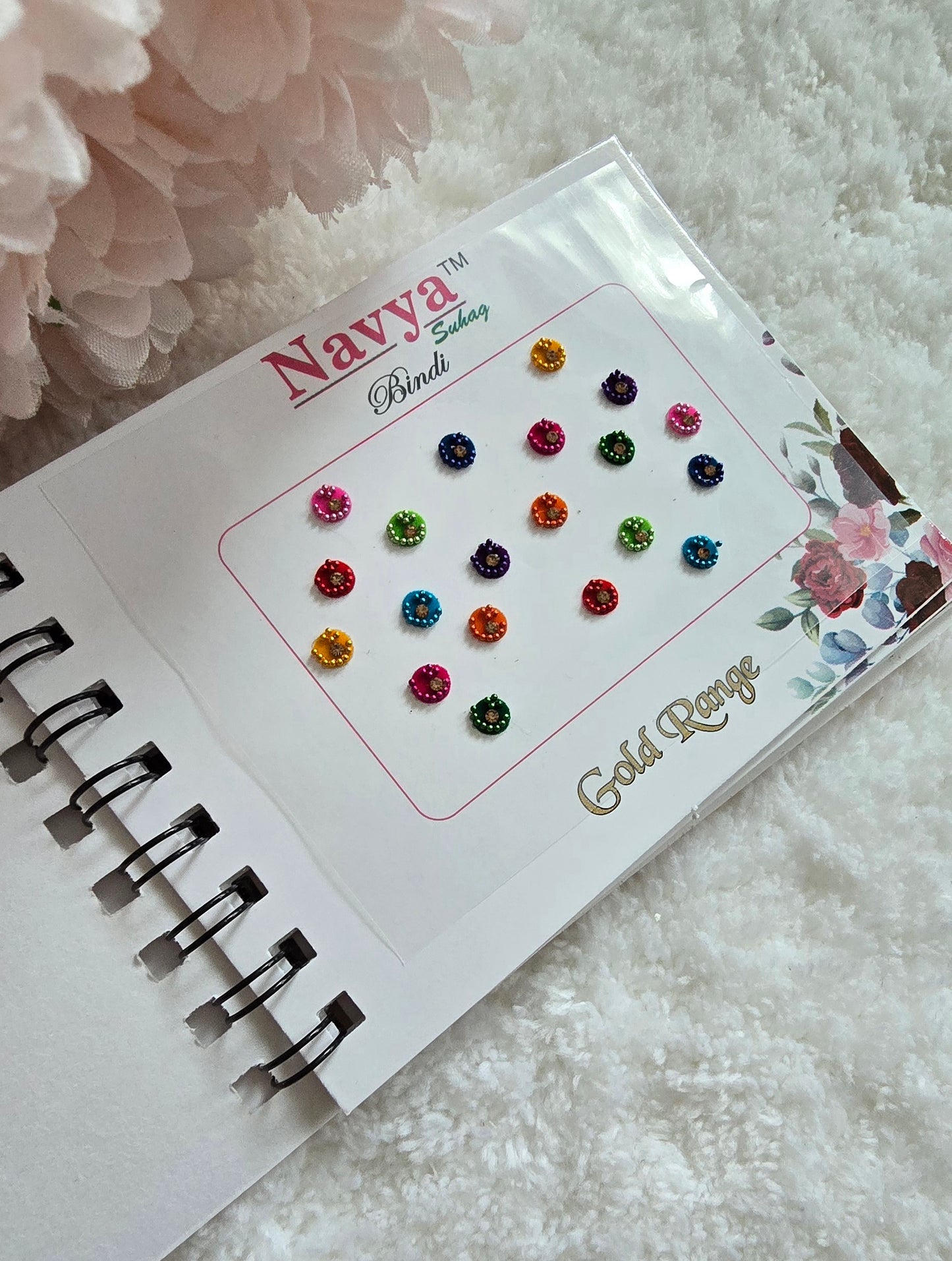 Pack of 4 - Navya multi-colored pocket size party wear fancy stone studded spiral Bindi book.