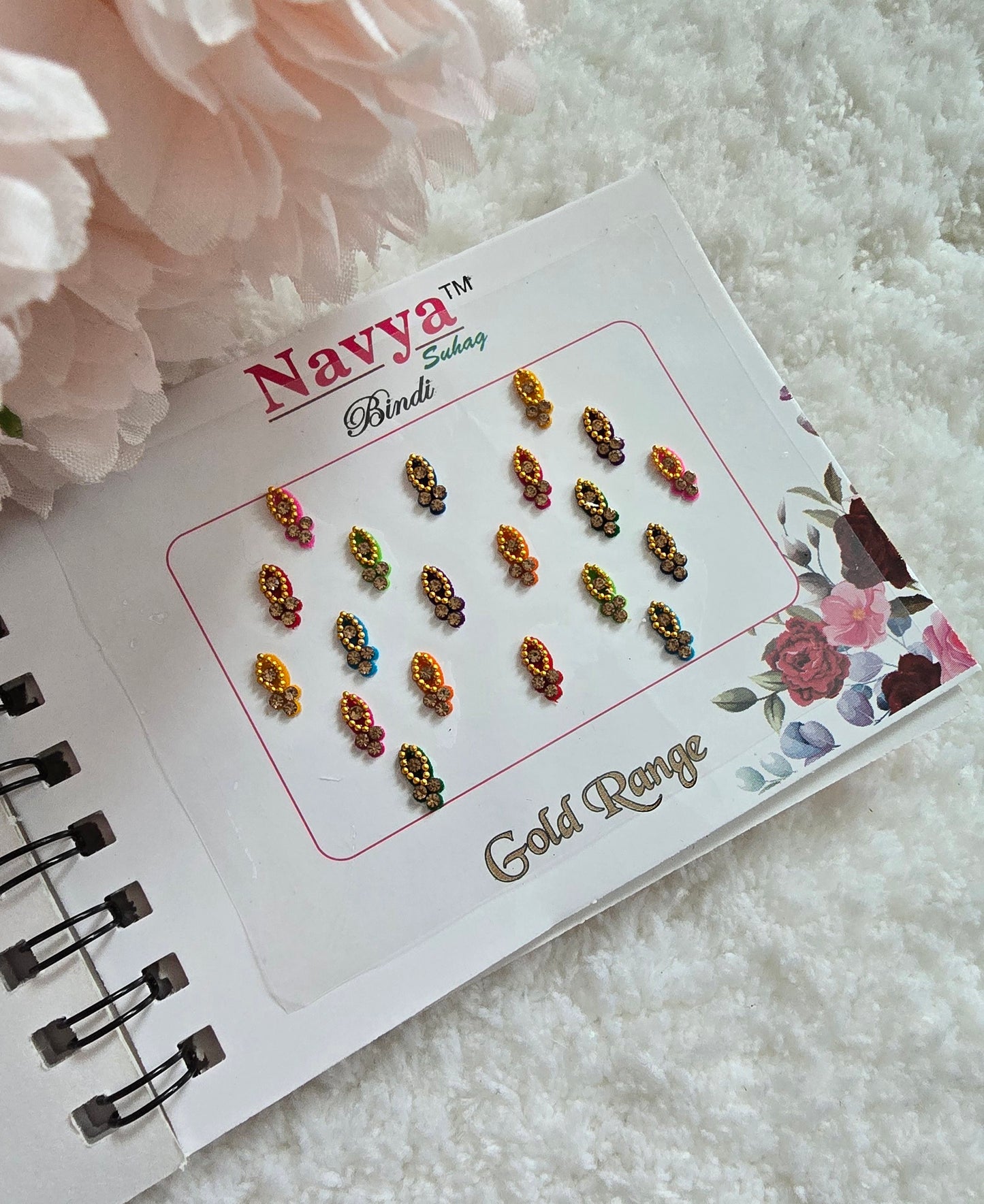 Pack of 4 - Navya multi-colored pocket size party wear fancy stone studded spiral Bindi book.