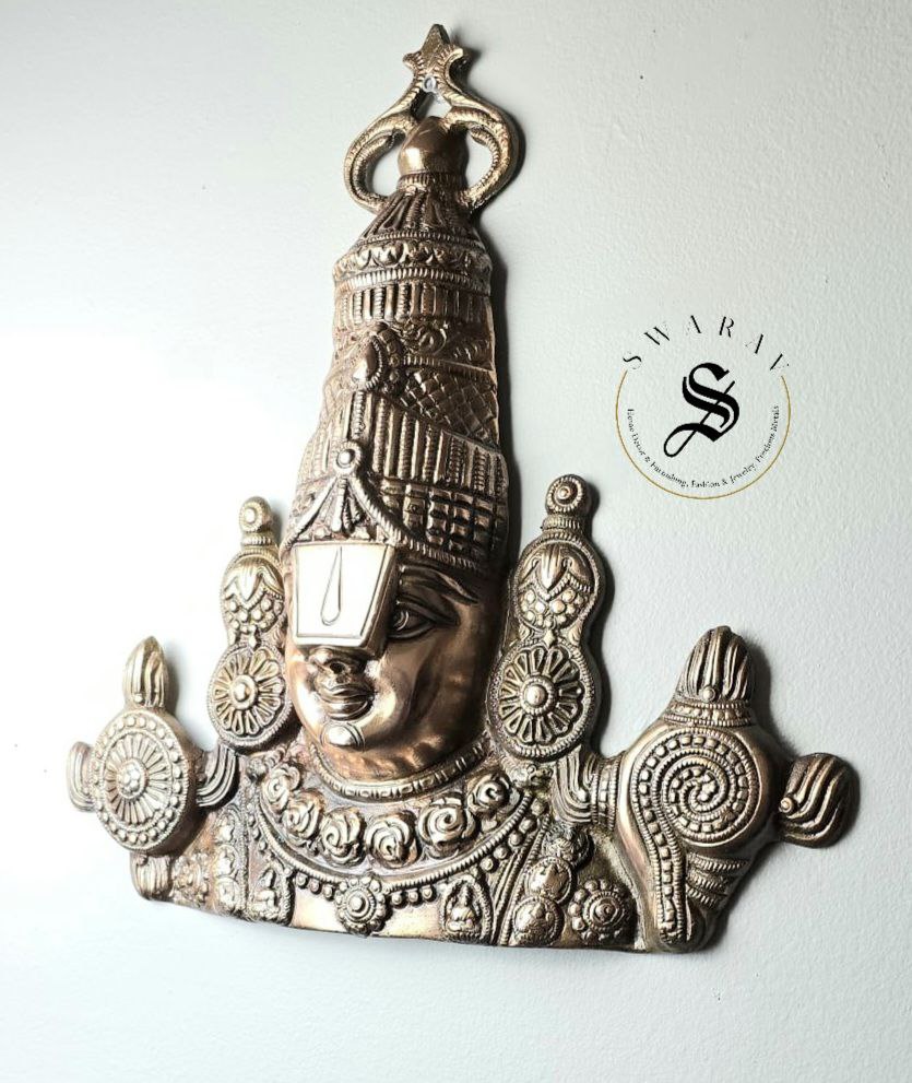 Black metal Balaji wall decor. Size - 15 by 12 inch