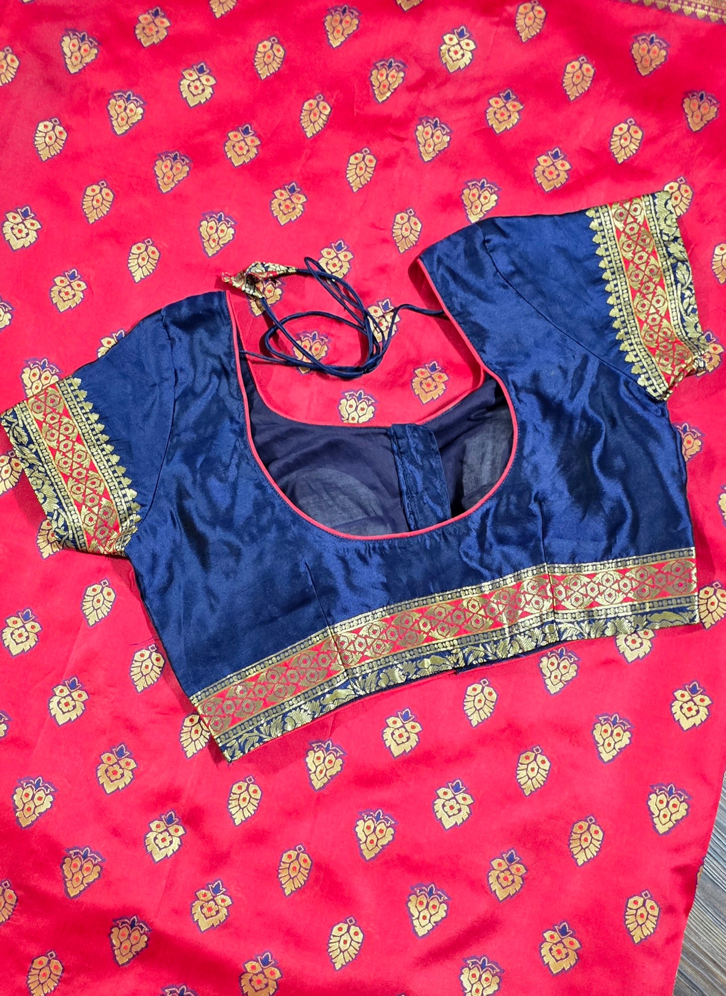 Art Silk soft saree in zari weave border and butas with stitched Blouse.