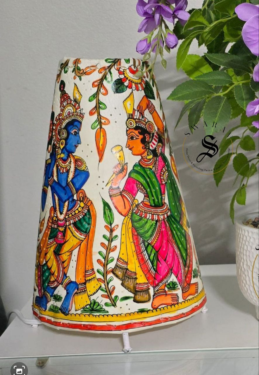Multi color Hand-made leather lamp shade with hand painted theme of Radha- Krishna. Size - 12 inch.