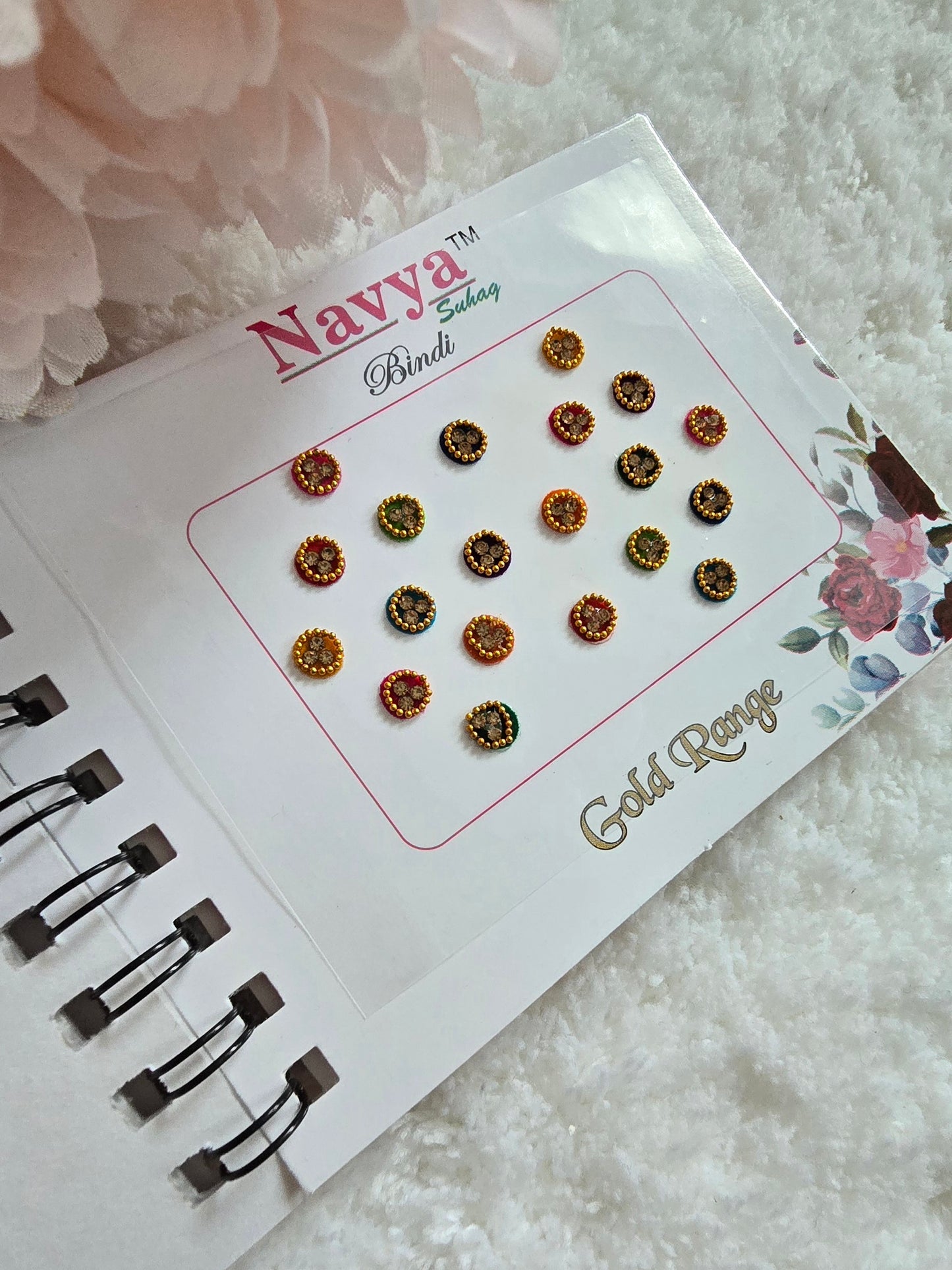 Pack of 4 - Navya multi-colored pocket size party wear fancy stone studded spiral Bindi book.