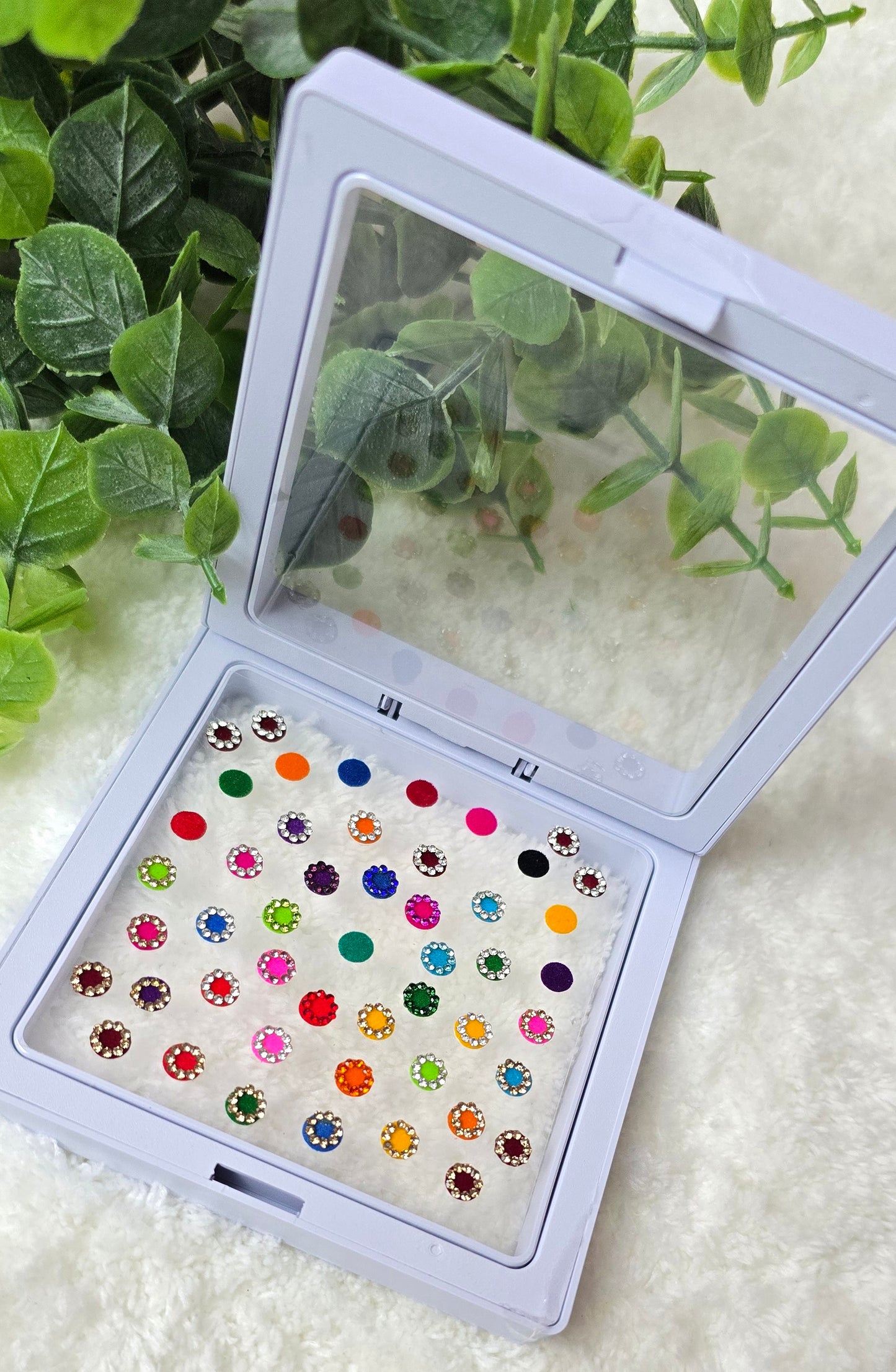 Sun - Rose 50 count multi color and multi design Bindi in see through Box.