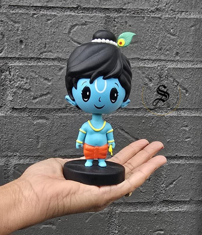 Car Dashboard Accessories - miniature Krishna with bobble head.