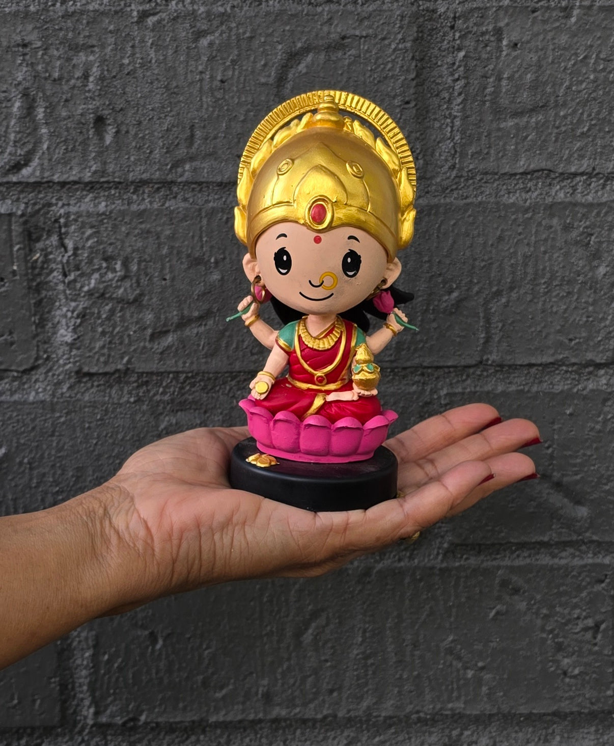 Car Dashboard Accessories - miniature Lakshmi with bobblehead.