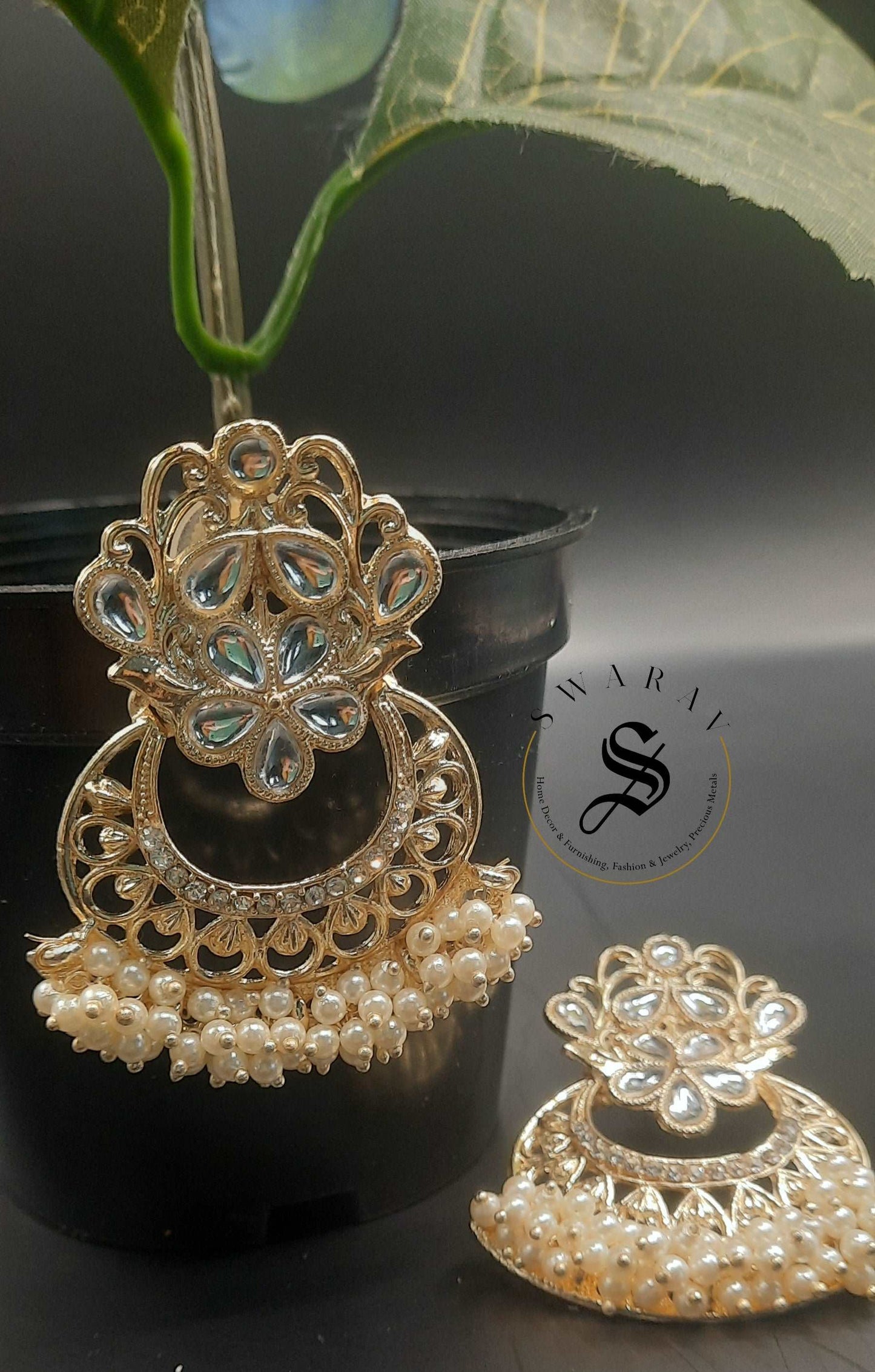 White cluster pearls and Kundan Earing.