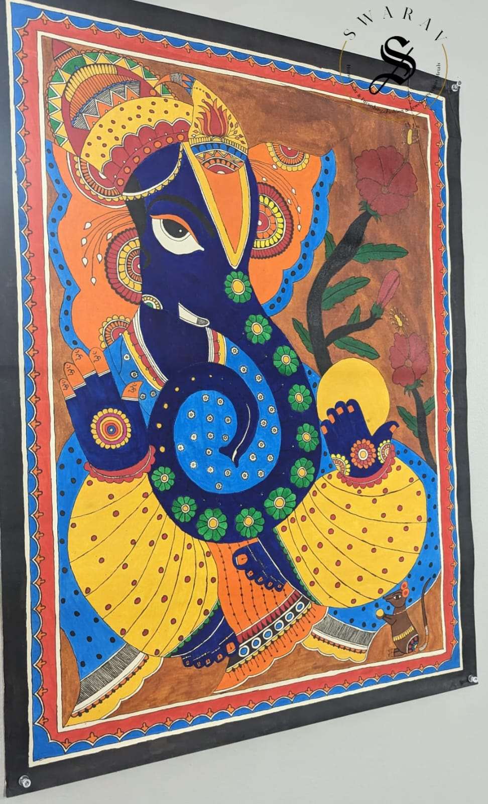 Madhubani or Mithila Painting – Lord Ganesha with his beautiful ornaments and Laddu in hand.