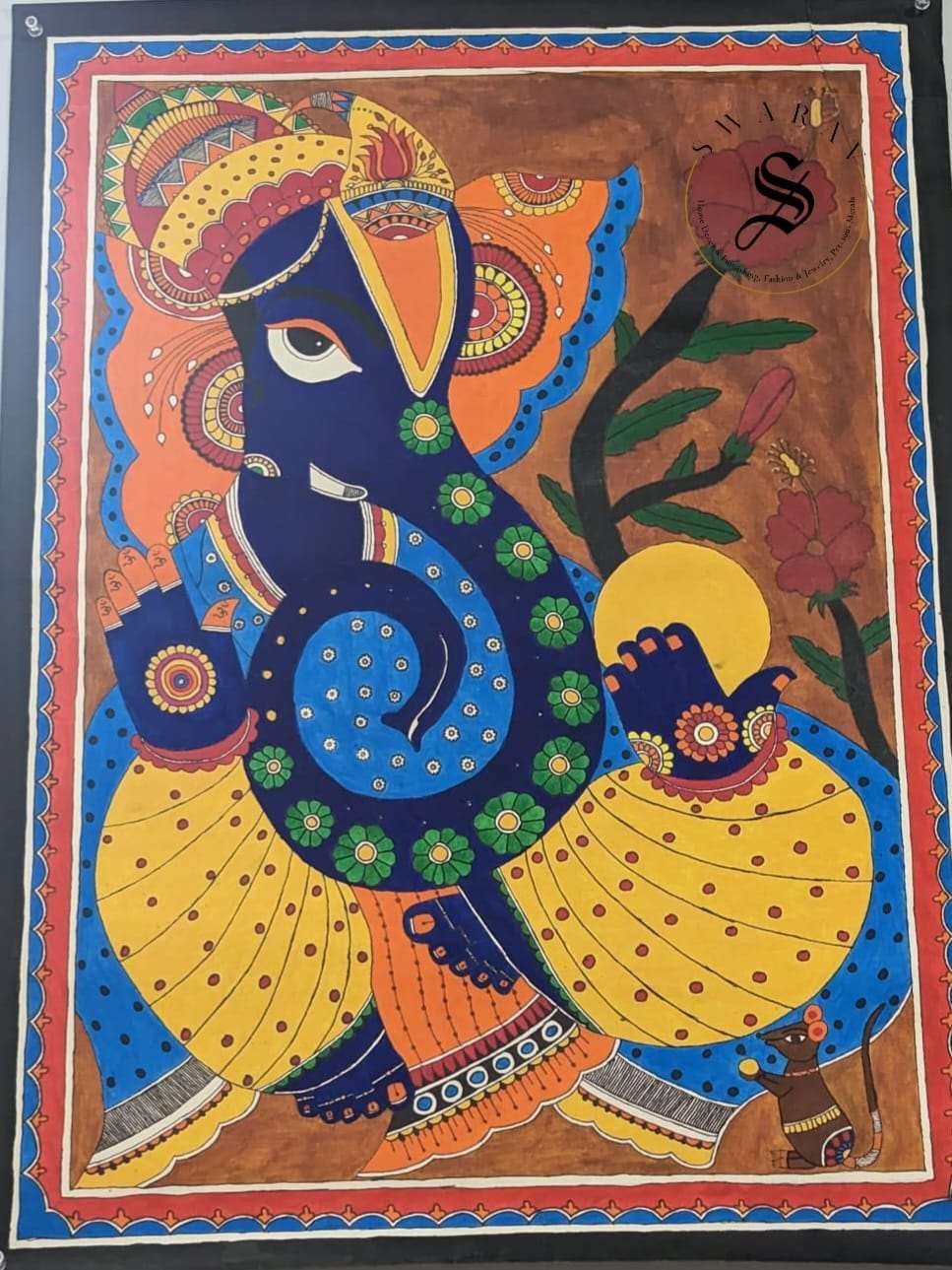 Madhubani or Mithila Painting – Lord Ganesha with his beautiful ornaments and Laddu in hand.