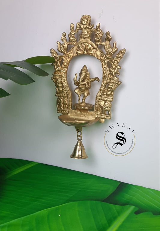 Brass Dancing Ganesha Wall mount oil Lamp with Bell.