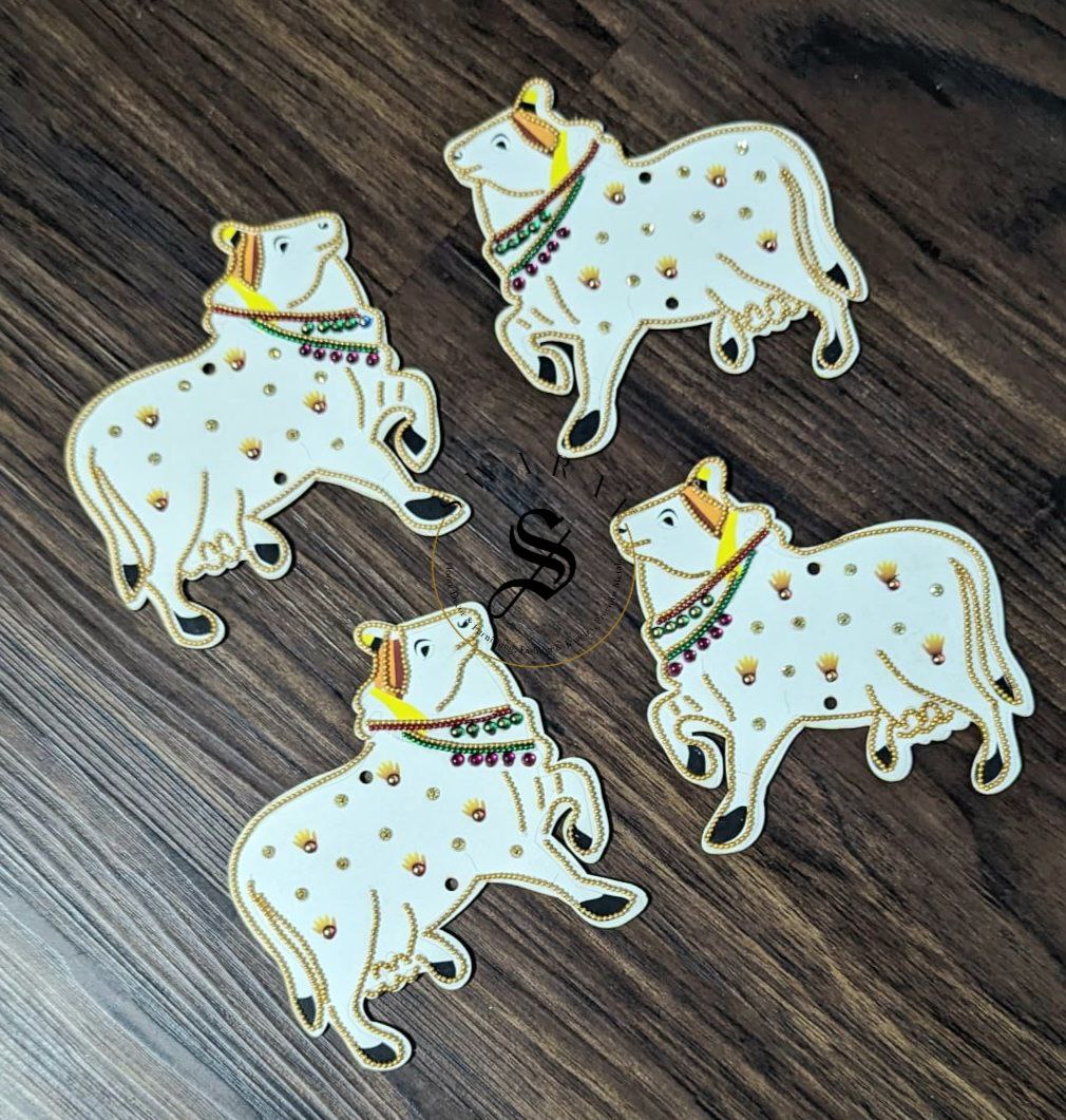 Set of 4 - MDF cut Cow décor with sequence and stone work.