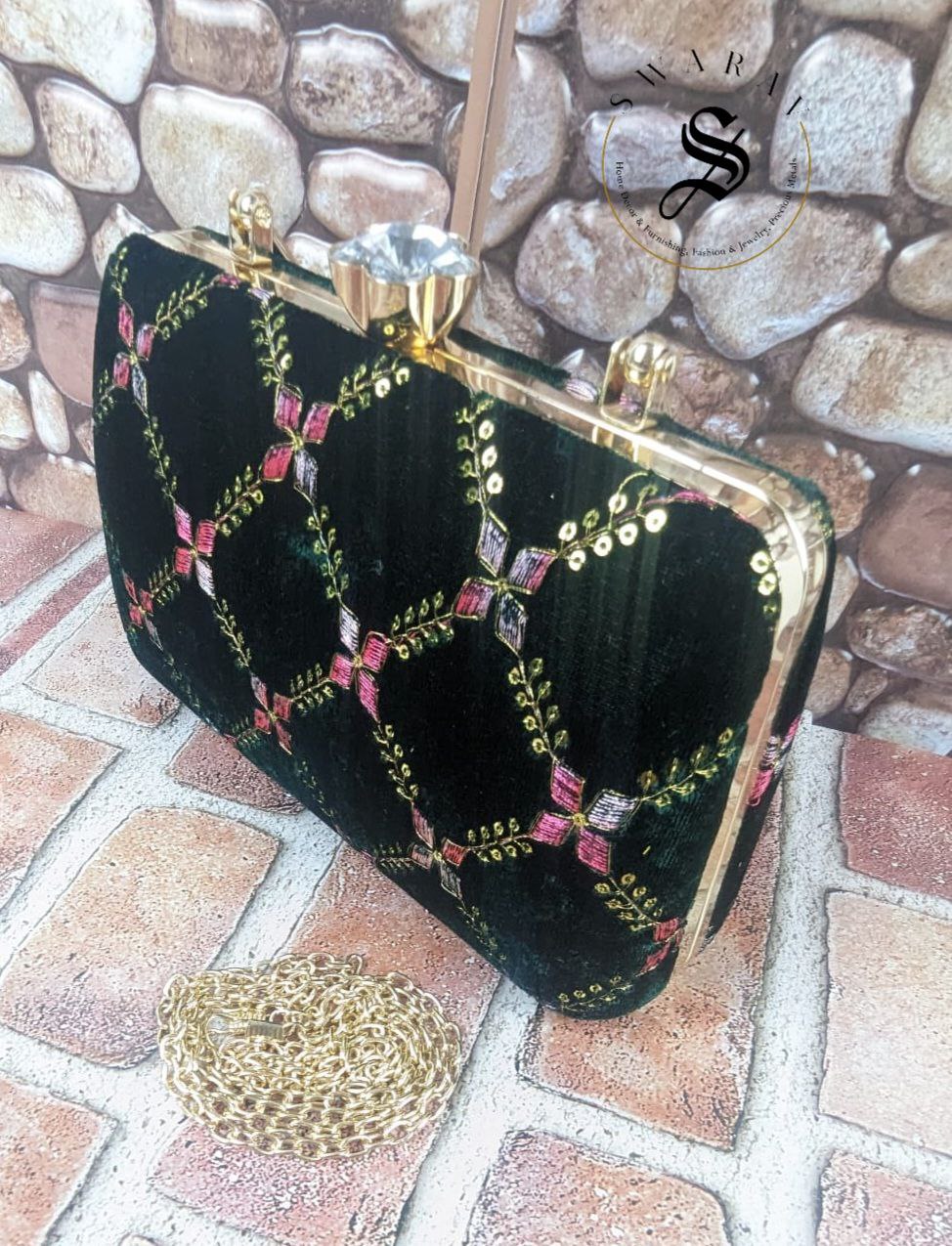 Sequence and embroidered Party Clutch - Size : 9 by 5 by 2 inches. Color - Leather Black.