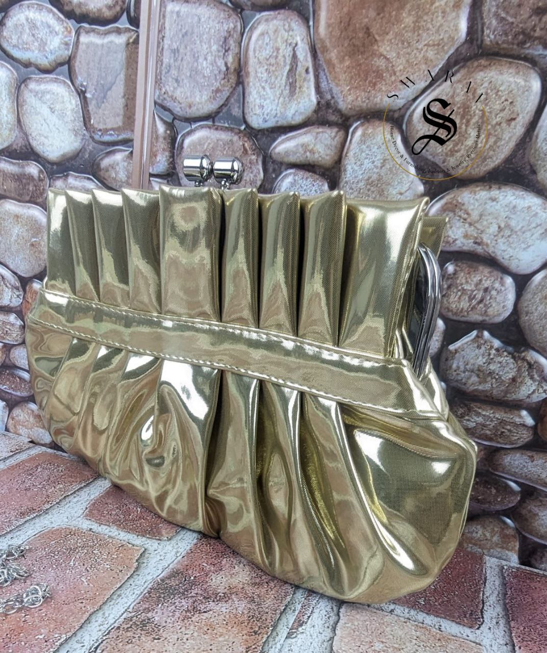 Women's Pleated crystal stone broach Party clutch. Size - 9 by 5 inch. Color - Golden.