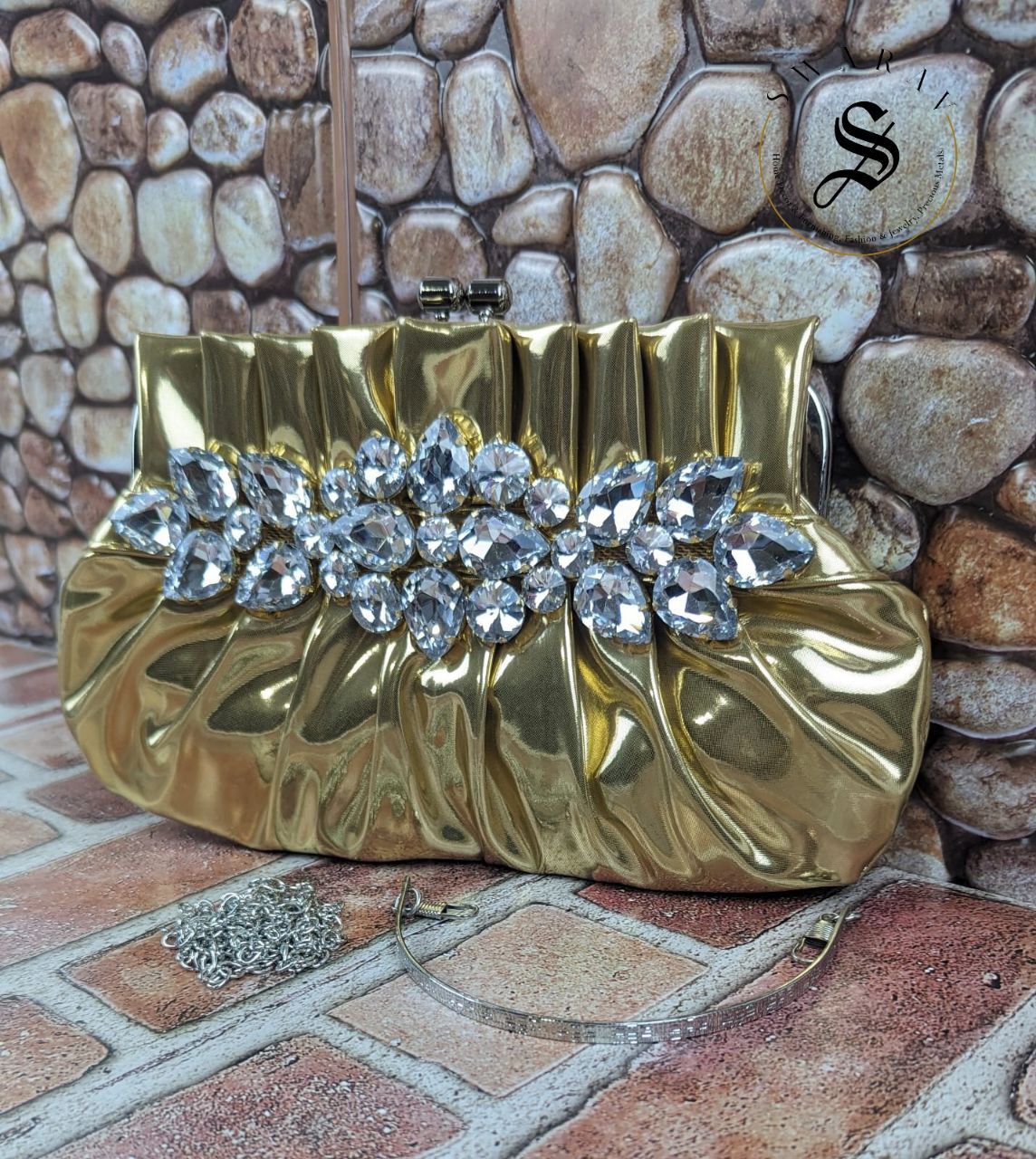 Women's Pleated crystal stone broach Party clutch. Size - 9 by 5 inch. Color - Golden.