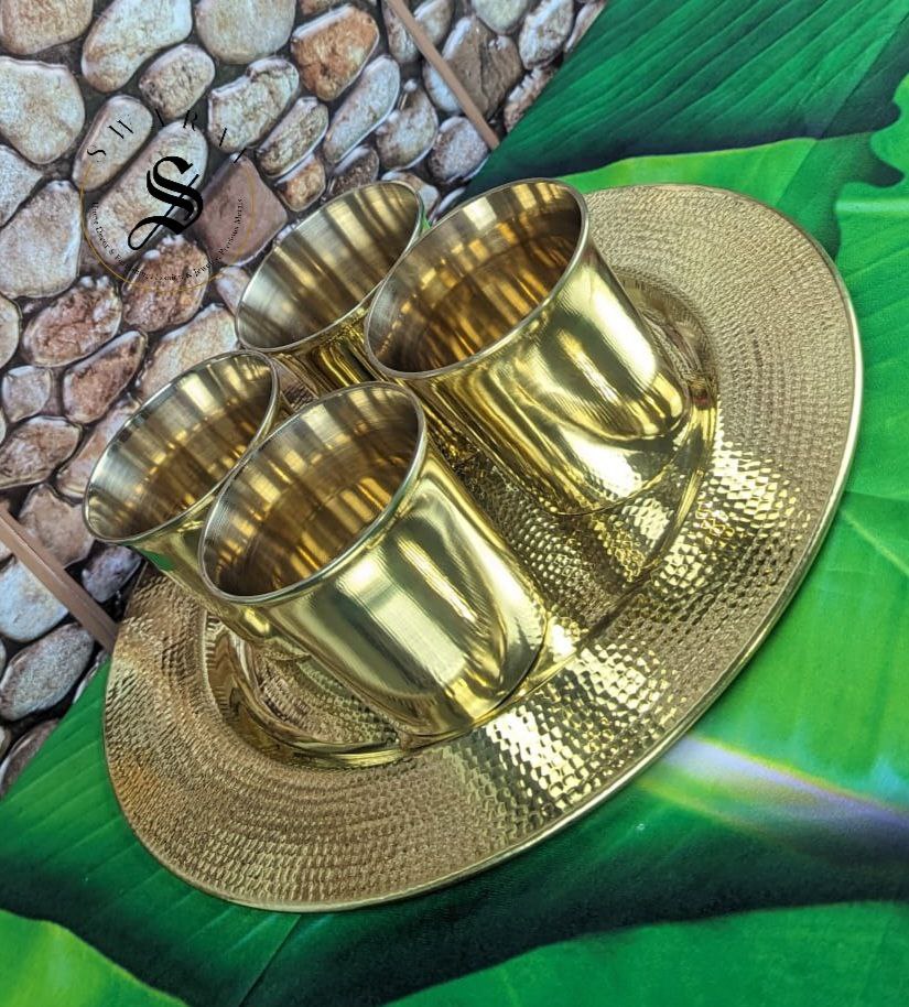 Set of 5 - 4 Bronze/ Kansa / Kanchu Glasses and 1 Hand Hammered Brass Serving Tray with FREE GIFT BOX. Set weight without gift box - 1100 grams. ( Does not include Gift box weight )