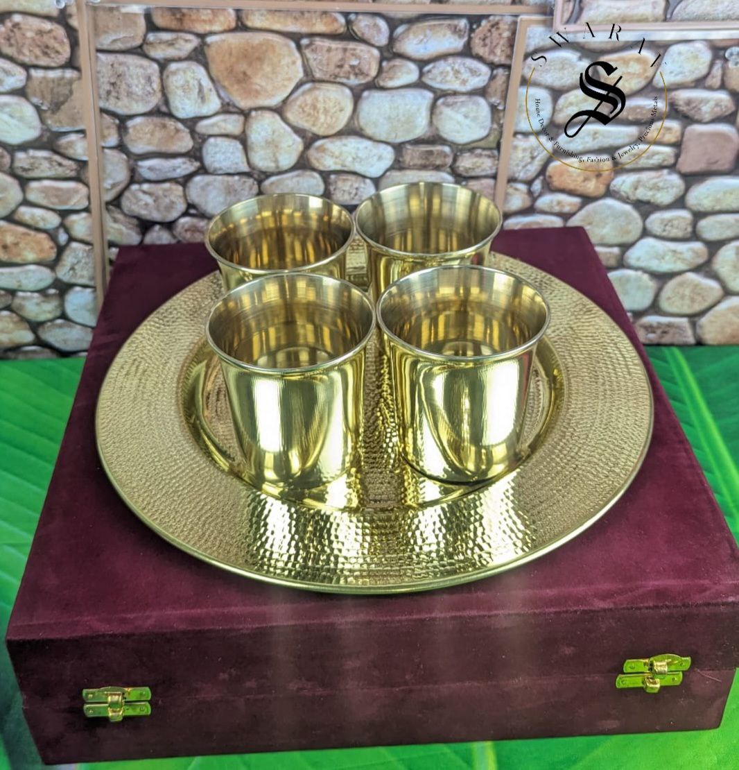 Set of 5 - 4 Bronze/ Kansa / Kanchu Glasses and 1 Hand Hammered Brass Serving Tray with FREE GIFT BOX. Set weight without gift box - 1100 grams. ( Does not include Gift box weight )