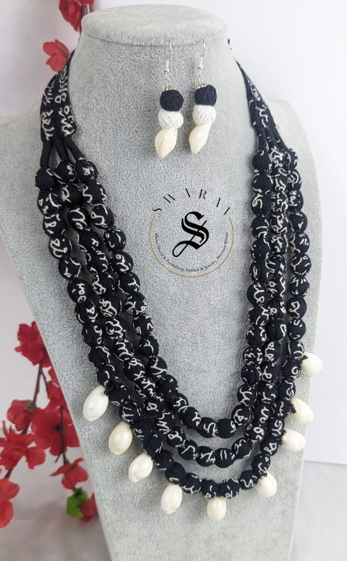 Hand made script print Fabric ball 3 layer Haar/ long necklace in black and white print with matching earrings with sea shells - Design Code - D5