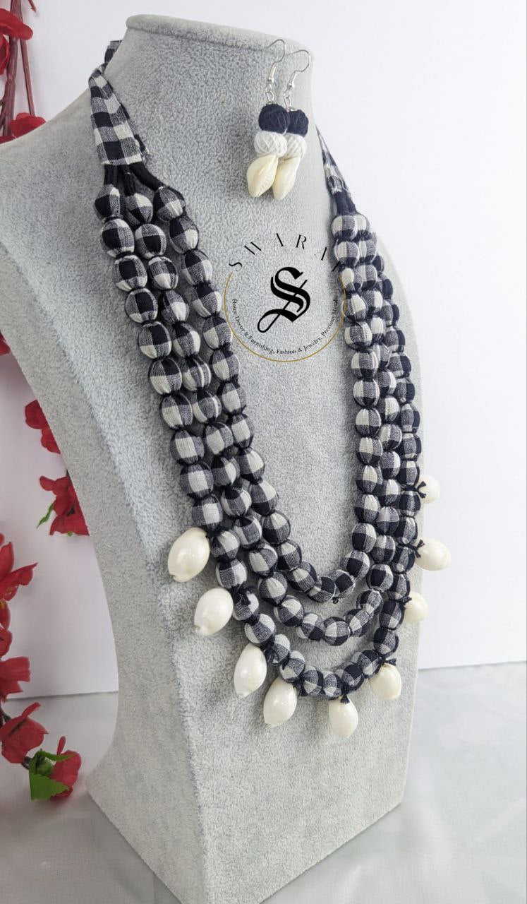 Hand made Fabric ball 3 layer Haar/ long necklace in black and white check print with matching earrings with sea shells - Design Code - D6