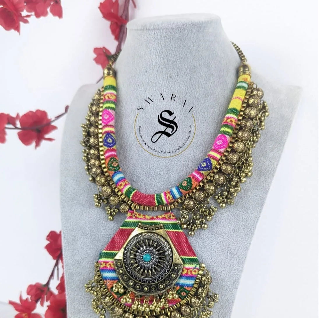 Multi color Fabric Necklace with brass beads and big size pendant.