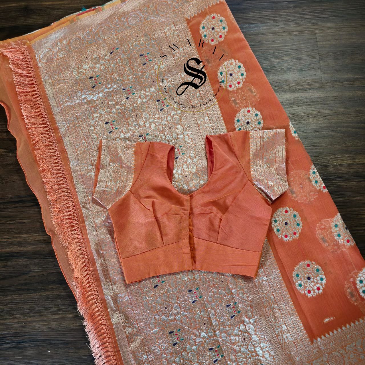 Organza by Cotton Zari weave Saree with stitched blouse. Color - Saffron.