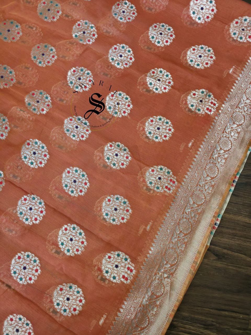 Organza by Cotton Zari weave Saree with stitched blouse. Color - Saffron.