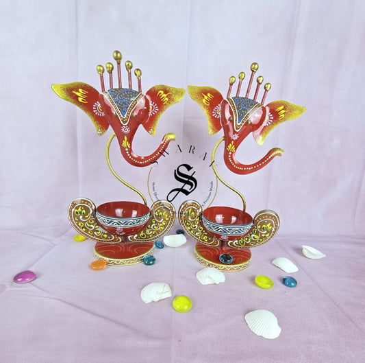 Hand painted wrought Iron Ganesha Tea light stand. Set of 2. Size 11 by 7 inches.