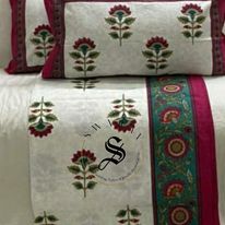 Jaipur Pure Cotton Queen Size Bedsheet Set - 102 by 88 inch. Floral stem print on white.