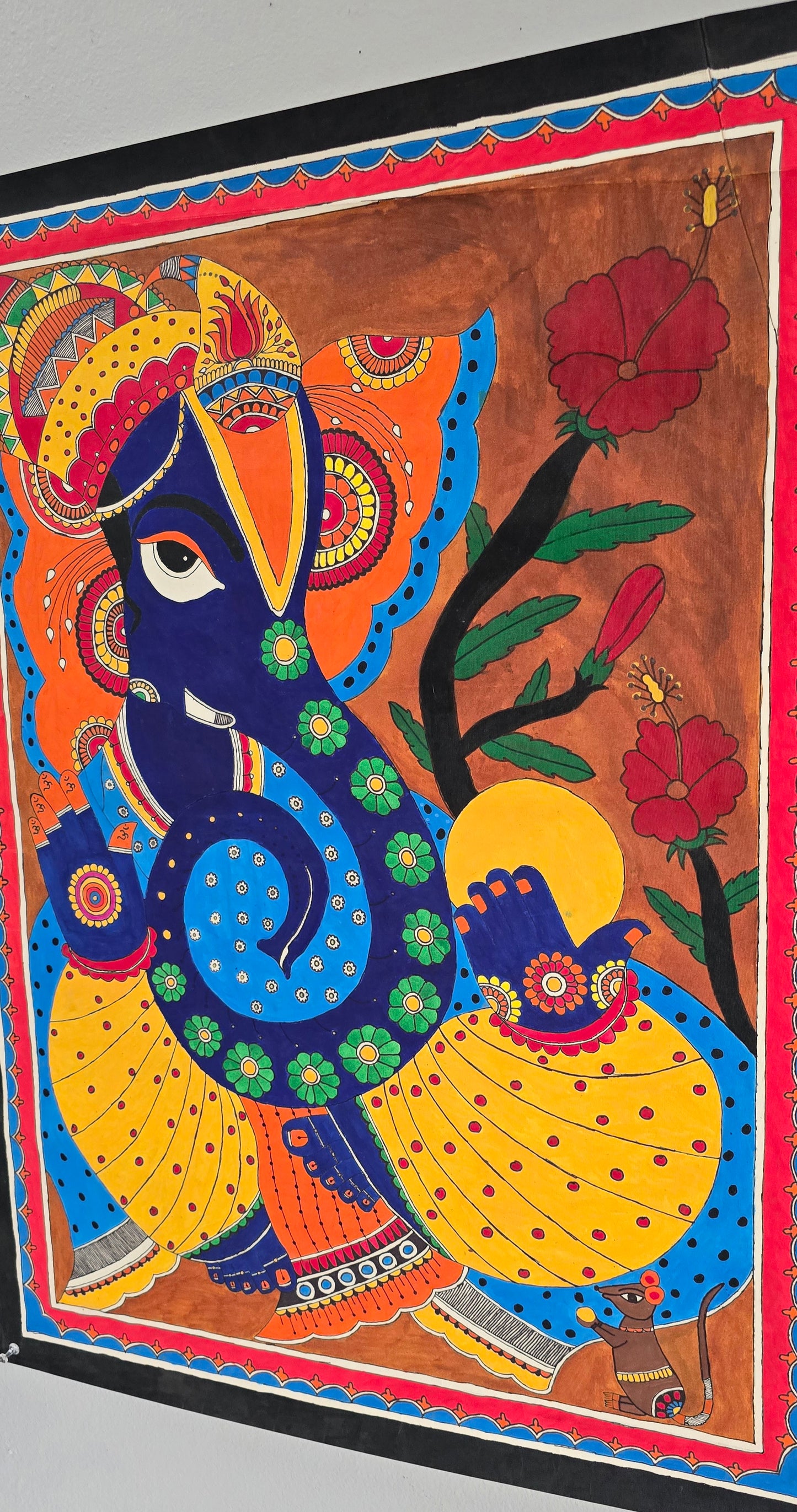 Madhubani or Mithila Painting – Lord Ganesha with his beautiful ornaments and Laddu in hand.
