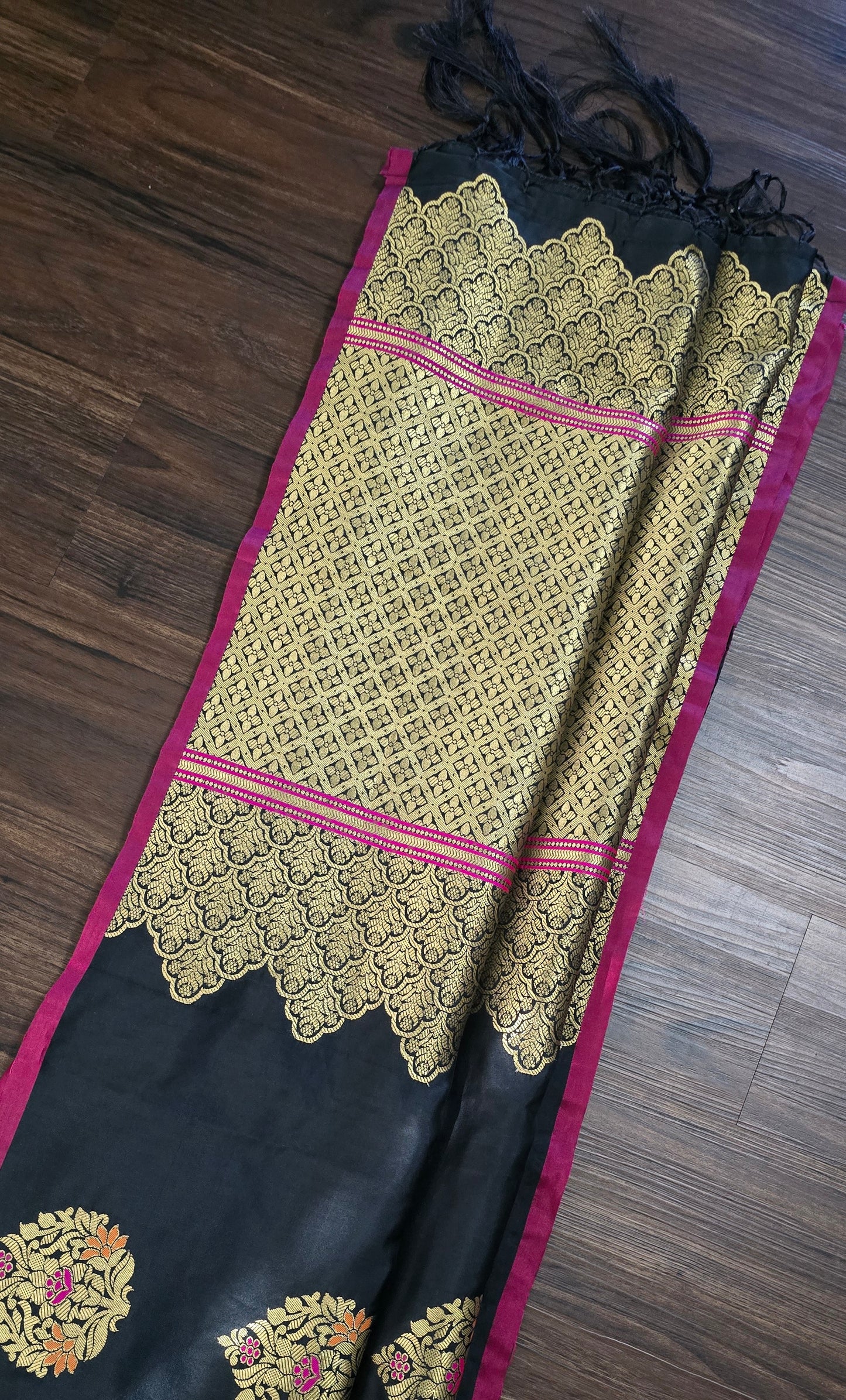 Black Art Silk soft saree in zari weave border and butas with stitched Blouse.