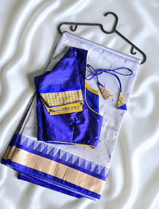 Silver- Grey color Sambalpuri Bomkai silk Saree with stitched contrast Royal blue Blouse. Code - SAR105