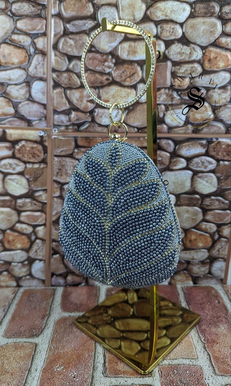 Coconut shape Denim blue beads leaf pattern party Clutch .