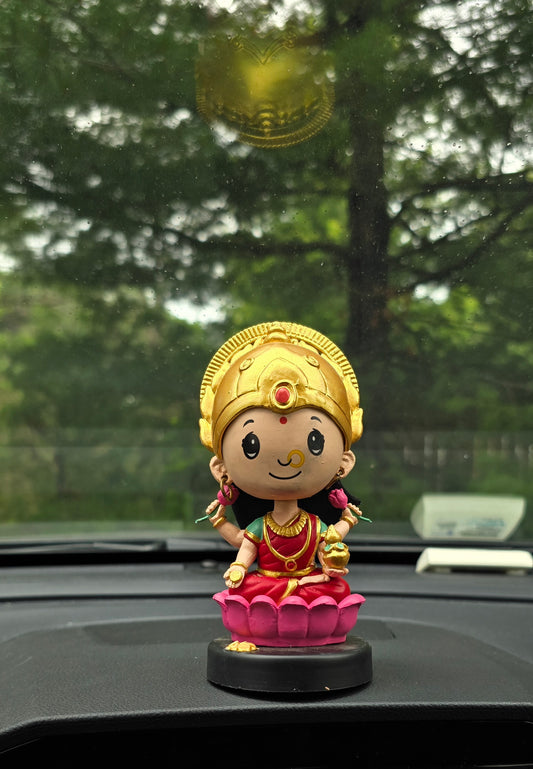 Car Dashboard Accessories - miniature Lakshmi with bobblehead.