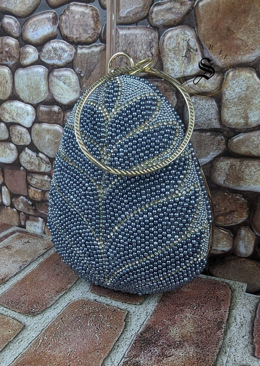 Coconut shape Denim blue beads leaf pattern party Clutch .