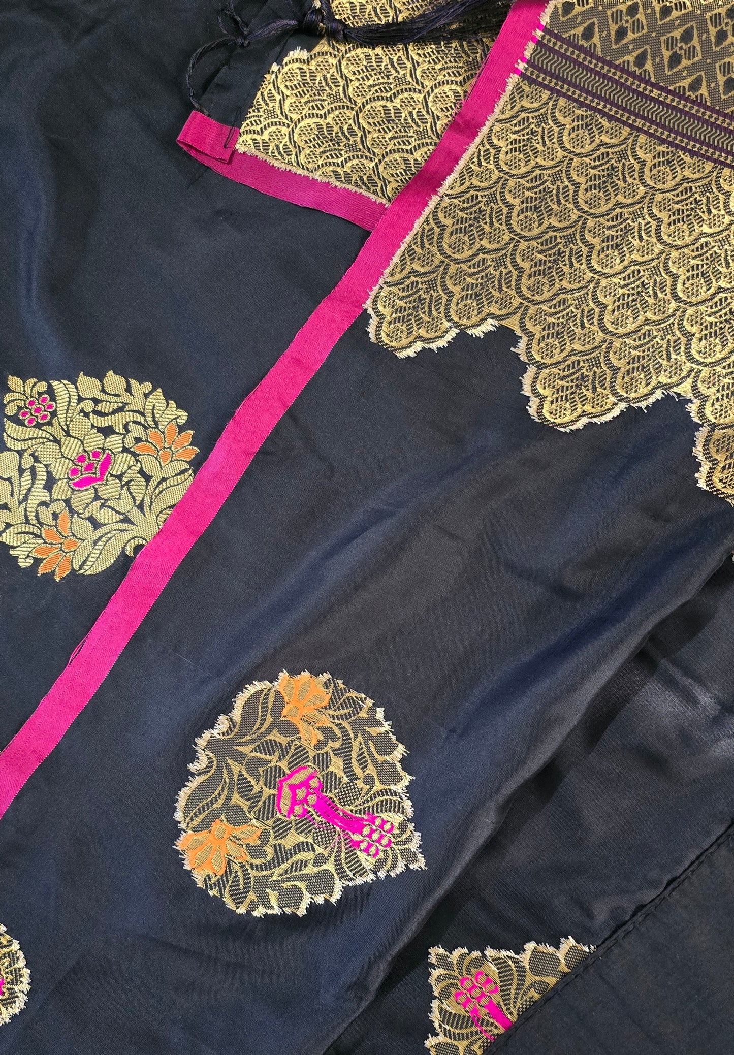 Black Art Silk soft saree in zari weave border and butas with stitched Blouse.