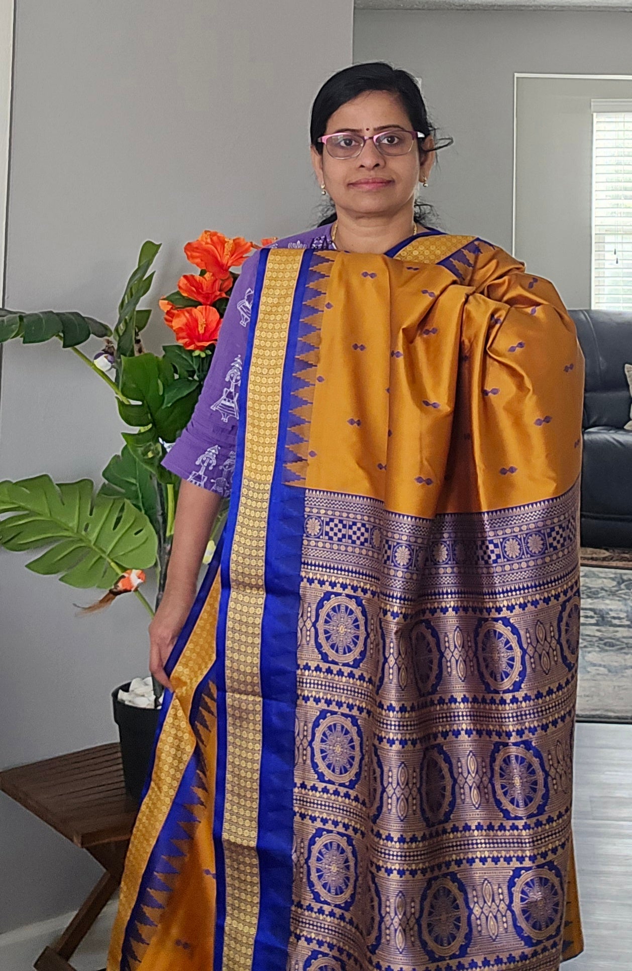 Mustard/turmeric yellow Sambalpuri Bomkai silk saree with royal blue stitched blouse. Code - SAR103