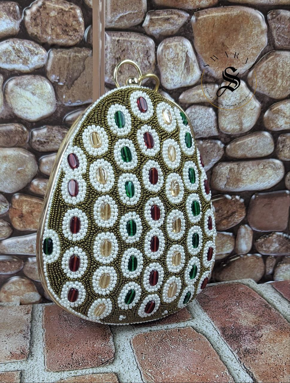 Coconut shape multi color oval beads party clutch.